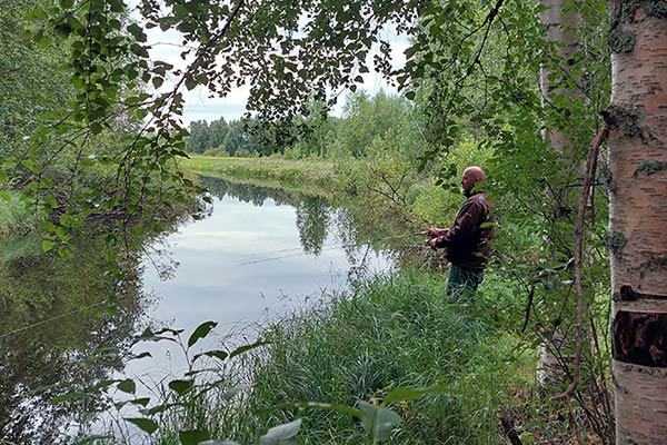 An angler at a lake